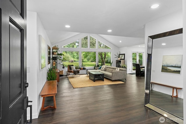 16100 SE 113th Pl, Renton, WA 98059 - living area featuring wood finished floors, baseboards, lofted ceiling, and recessed lighting