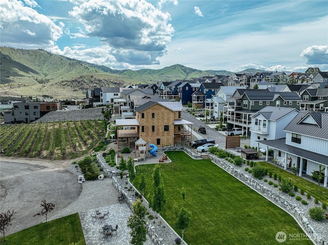 203 Bluebell Ct, Chelan, WA 98816 - aerial view of residential area featuring a mountain backdrop