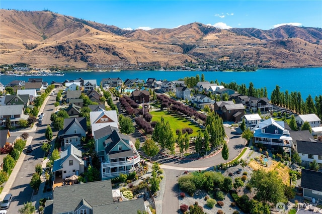 203 Bluebell Ct, Chelan, WA 98816 - aerial overview of property's location featuring a water and mountain view and nearby suburban area