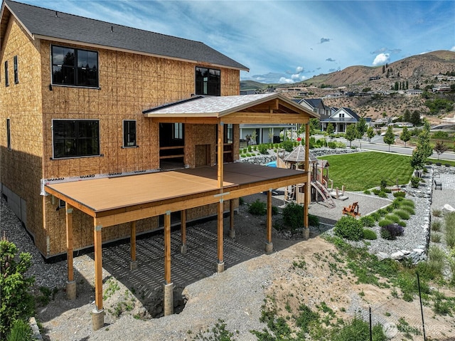 203 Bluebell Ct, Chelan, WA 98816 - back of property with a deck with mountain view