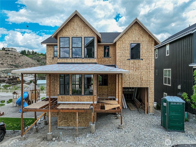 203 Bluebell Ct, Chelan, WA 98816 - view of front of house featuring a sunroom and a shingled roof