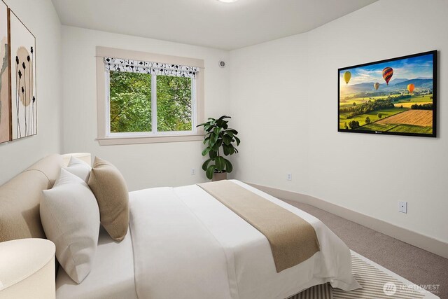 18609 SE Newport Way Unit 408, Issaquah, WA 98027 - carpeted bedroom with baseboards