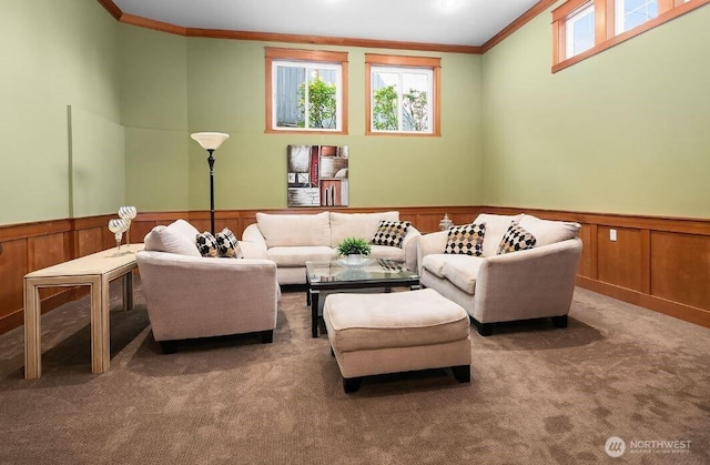 18609 SE Newport Way Unit 408, Issaquah, WA 98027 - carpeted living area featuring crown molding, plenty of natural light, and a wainscoted wall
