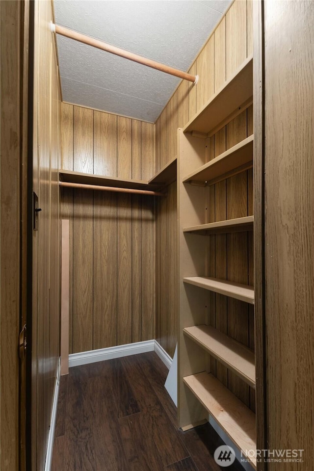 11216 127th St E Unit 19, Puyallup, WA 98374 - walk in closet featuring dark wood finished floors