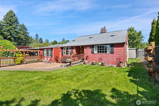 2526 19th St, Bremerton, WA 98312 - back of property featuring a patio area and a chimney