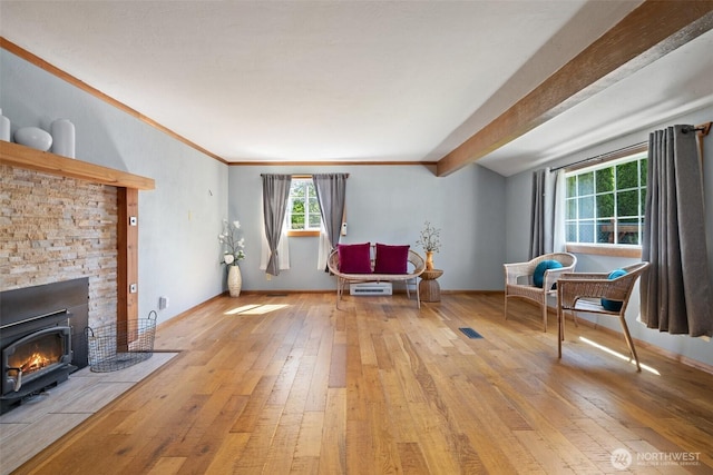 2526 19th St, Bremerton, WA 98312 - living area featuring light wood-type flooring, crown molding, and a fireplace with flush hearth