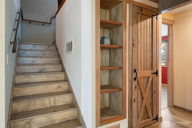 2526 19th St, Bremerton, WA 98312 - staircase featuring wood finished floors and baseboards