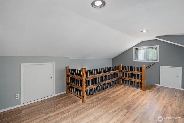 2526 19th St, Bremerton, WA 98312 - additional living space with wood finished floors, lofted ceiling, baseboards, and recessed lighting