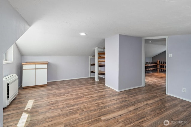 2526 19th St, Bremerton, WA 98312 - additional living space with lofted ceiling, wood finished floors, baseboards, recessed lighting, and heating unit