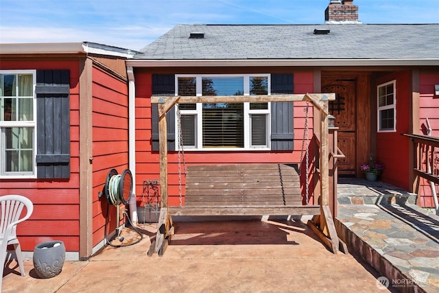 2526 19th St, Bremerton, WA 98312 - rear view of house featuring a chimney and a shingled roof