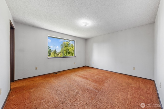 1015 143rd St S, Tacoma, WA 98444 - spare room featuring carpet floors and a textured ceiling