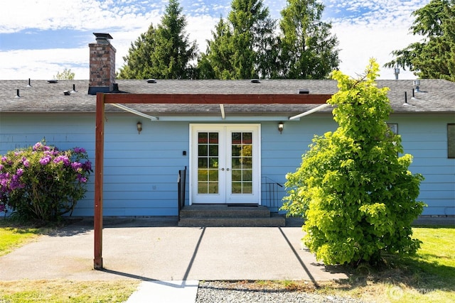 1119 Sunset Ave, Bellingham, WA 98226 - rear view of property with french doors, a chimney, and a shingled roof