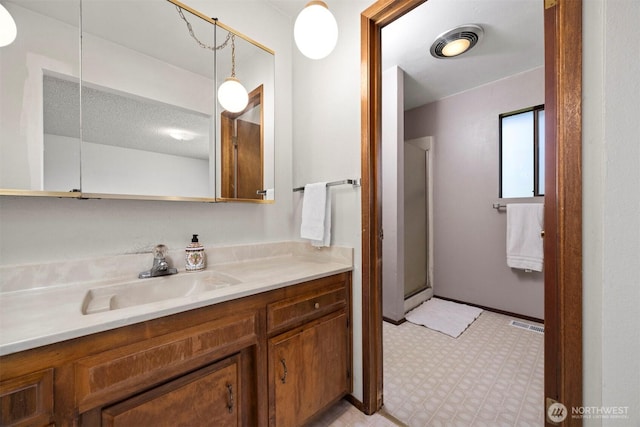 1119 Sunset Ave, Bellingham, WA 98226 - bathroom with vanity, tile patterned floors, and a shower stall