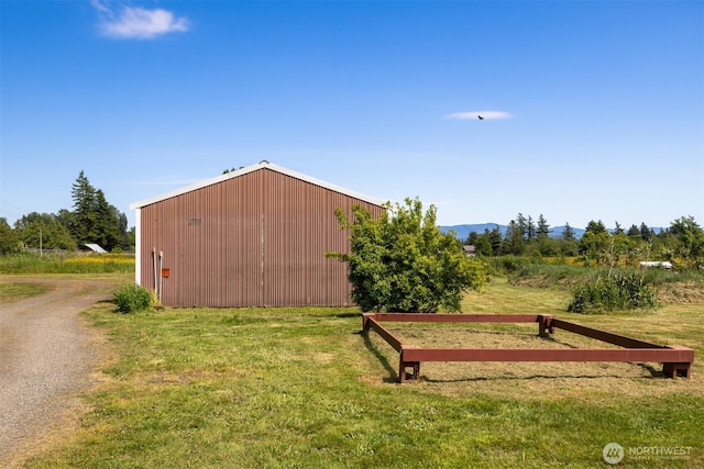1119 Sunset Ave, Bellingham, WA 98226 - view of pole building with a yard and a mountain view