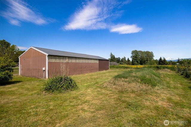 1119 Sunset Ave, Bellingham, WA 98226 - view of green lawn featuring a pole building and an outbuilding