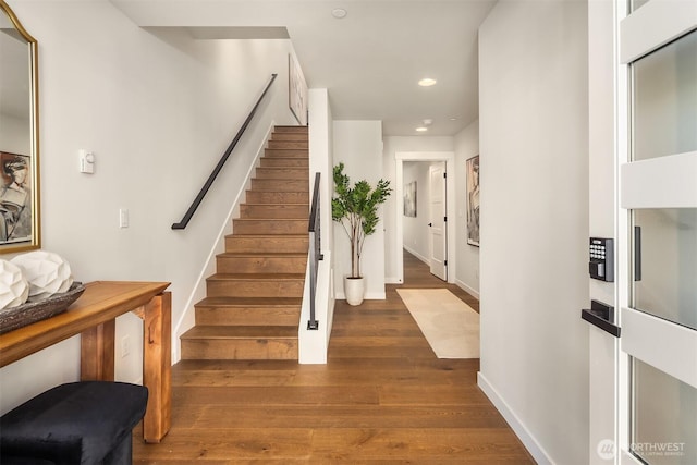 19722 Filbert Dr Unit A-3, Bothell, WA 98012 - staircase featuring wood finished floors, recessed lighting, and baseboards