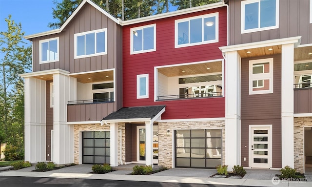 19722 Filbert Dr Unit A-3, Bothell, WA 98012 - view of front of property with a balcony, stone siding, and board and batten siding