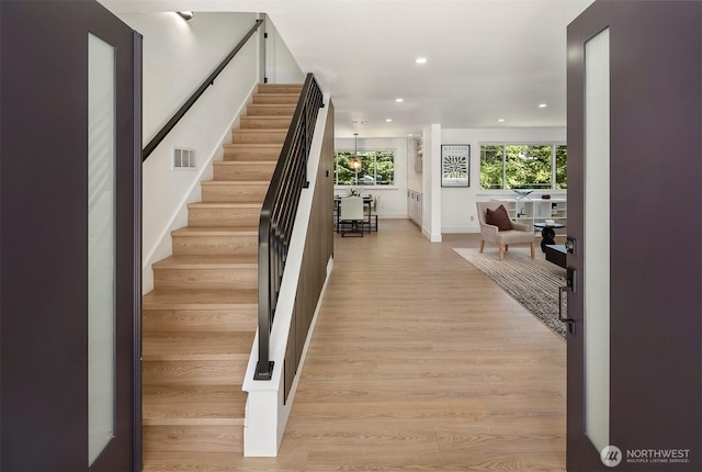 6202 122nd Ave SE, Bellevue, WA 98006 - stairs featuring wood finished floors and recessed lighting