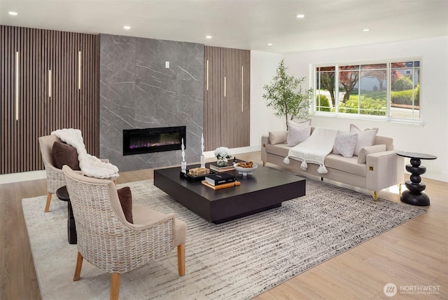 6202 122nd Ave SE, Bellevue, WA 98006 - living area with wood finished floors, recessed lighting, and a high end fireplace