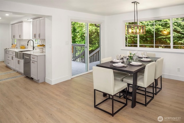 6202 122nd Ave SE, Bellevue, WA 98006 - dining room with light wood-type flooring, a chandelier, and recessed lighting