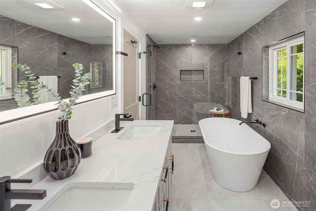 6202 122nd Ave SE, Bellevue, WA 98006 - full bath featuring tile walls, a shower stall, double vanity, a freestanding bath, and recessed lighting