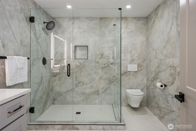 6202 122nd Ave SE, Bellevue, WA 98006 - full bathroom featuring a marble finish shower, tile walls, vanity, and recessed lighting
