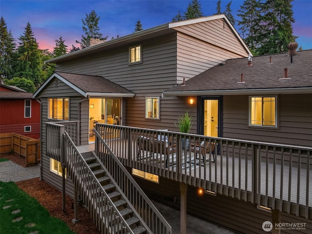 6202 122nd Ave SE, Bellevue, WA 98006 - view of front of property featuring stairway, a deck, a shingled roof, and a chimney