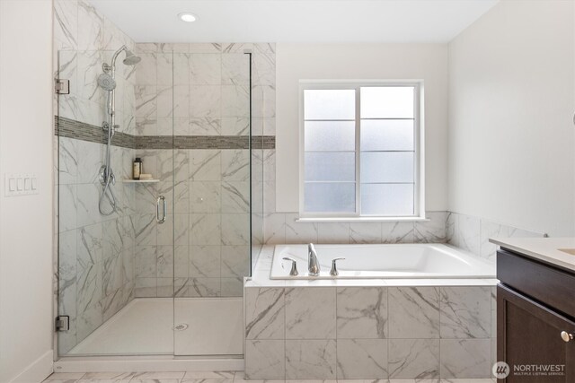 26627 NE Boyd Way Unit 101, Duvall, WA 98019 - full bath with a garden tub, a stall shower, vanity, and recessed lighting