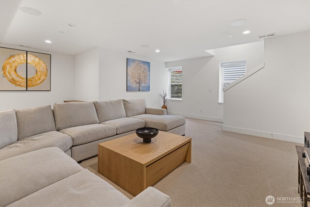 26627 NE Boyd Way Unit 101, Duvall, WA 98019 - living room featuring recessed lighting, light carpet, and baseboards