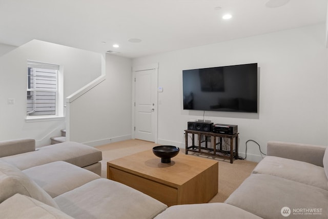 26627 NE Boyd Way Unit 101, Duvall, WA 98019 - living room featuring carpet flooring, stairs, recessed lighting, and baseboards
