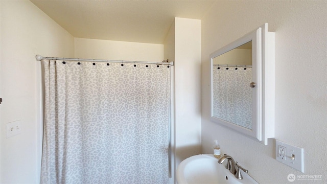 504 Ash St N, Omak, WA 98841 - bathroom with a shower with curtain and a sink
