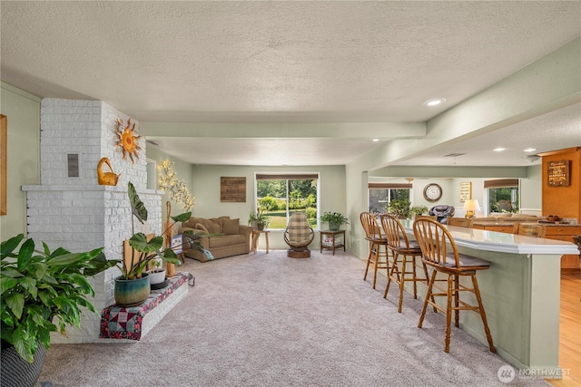 3256 S 360th St, Auburn, WA 98001 - living area featuring a textured ceiling, light carpet, and recessed lighting