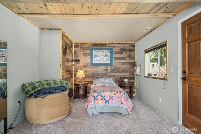 3256 S 360th St, Auburn, WA 98001 - bedroom featuring wood walls, carpet floors, and an accent wall