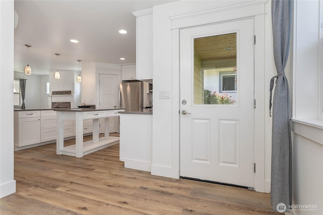 2730-2734 Nevada St, Bellingham, WA 98226 - foyer entrance featuring light wood-style flooring and recessed lighting