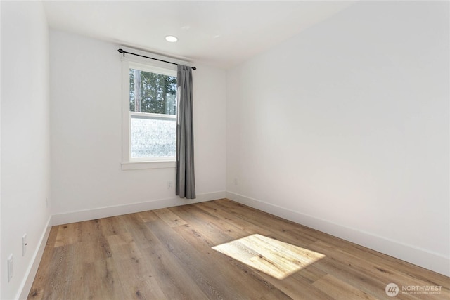 2730-2734 Nevada St, Bellingham, WA 98226 - spare room featuring baseboards, wood finished floors, and recessed lighting