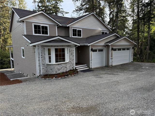 31823 44th Ave S, Auburn, WA 98001 - view of front of home featuring an attached garage, a shingled roof, asphalt driveway, and stone siding