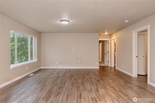 31823 44th Ave S, Auburn, WA 98001 - spare room with light wood finished floors and baseboards