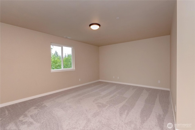 31823 44th Ave S, Auburn, WA 98001 - unfurnished room featuring carpet flooring and baseboards