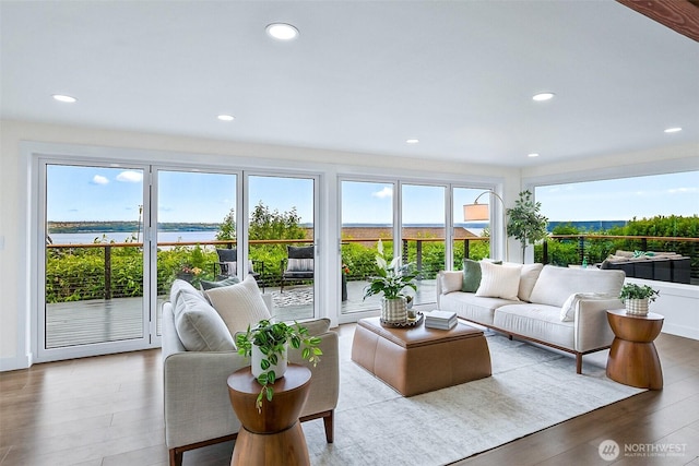 5942 Beverly Ave NE, Tacoma, WA 98422 - living room with wood finished floors, recessed lighting, and a water view