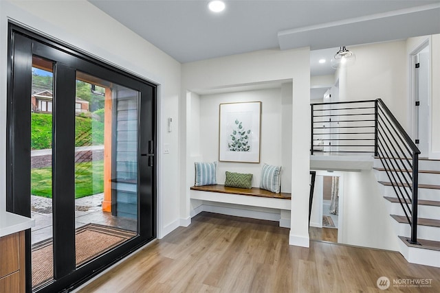 5942 Beverly Ave NE, Tacoma, WA 98422 - doorway to outside with light wood finished floors, stairs, baseboards, and recessed lighting
