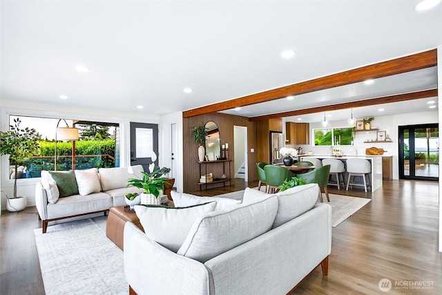 5942 Beverly Ave NE, Tacoma, WA 98422 - living room with recessed lighting, light wood-style flooring, beam ceiling, and a baseboard heating unit