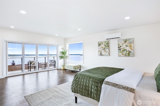 5942 Beverly Ave NE, Tacoma, WA 98422 - bedroom featuring a wall mounted air conditioner, multiple windows, access to exterior, wood finished floors, and recessed lighting