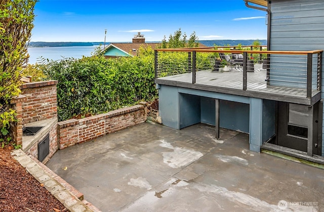 5942 Beverly Ave NE, Tacoma, WA 98422 - view of patio with a water view