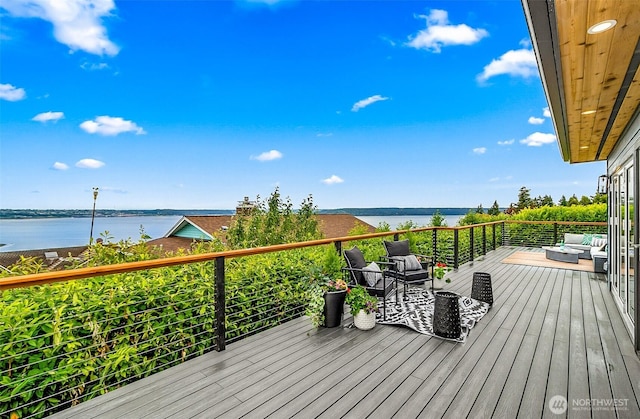 5942 Beverly Ave NE, Tacoma, WA 98422 - wooden deck with a water view and an outdoor hangout area