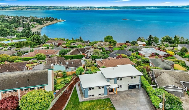 5942 Beverly Ave NE, Tacoma, WA 98422 - aerial perspective of suburban area with a nearby body of water