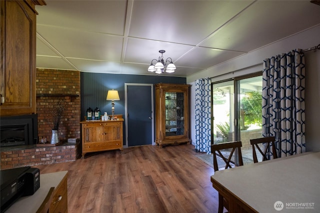 371 Pigeon Springs Rd, Onalaska, WA 98570 - dining space featuring wood finished floors and a chandelier