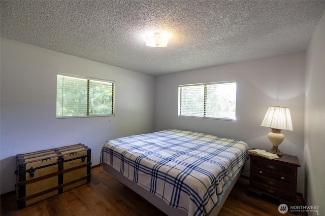 371 Pigeon Springs Rd, Onalaska, WA 98570 - bedroom featuring wood finished floors and a textured ceiling