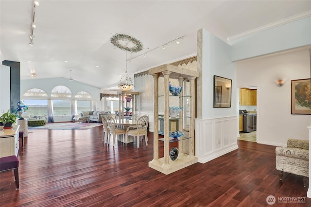 10903 Samish Beach Ln, Bow, WA 98232 - dining area with track lighting, vaulted ceiling, hardwood / wood-style flooring, washer and clothes dryer, and ceiling fan
