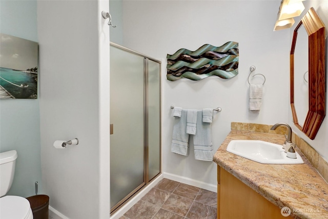 10903 Samish Beach Ln, Bow, WA 98232 - full bath with toilet, vanity, a stall shower, and baseboards