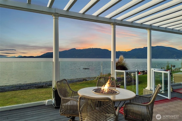 10903 Samish Beach Ln, Bow, WA 98232 - sunroom / solarium featuring a water and mountain view